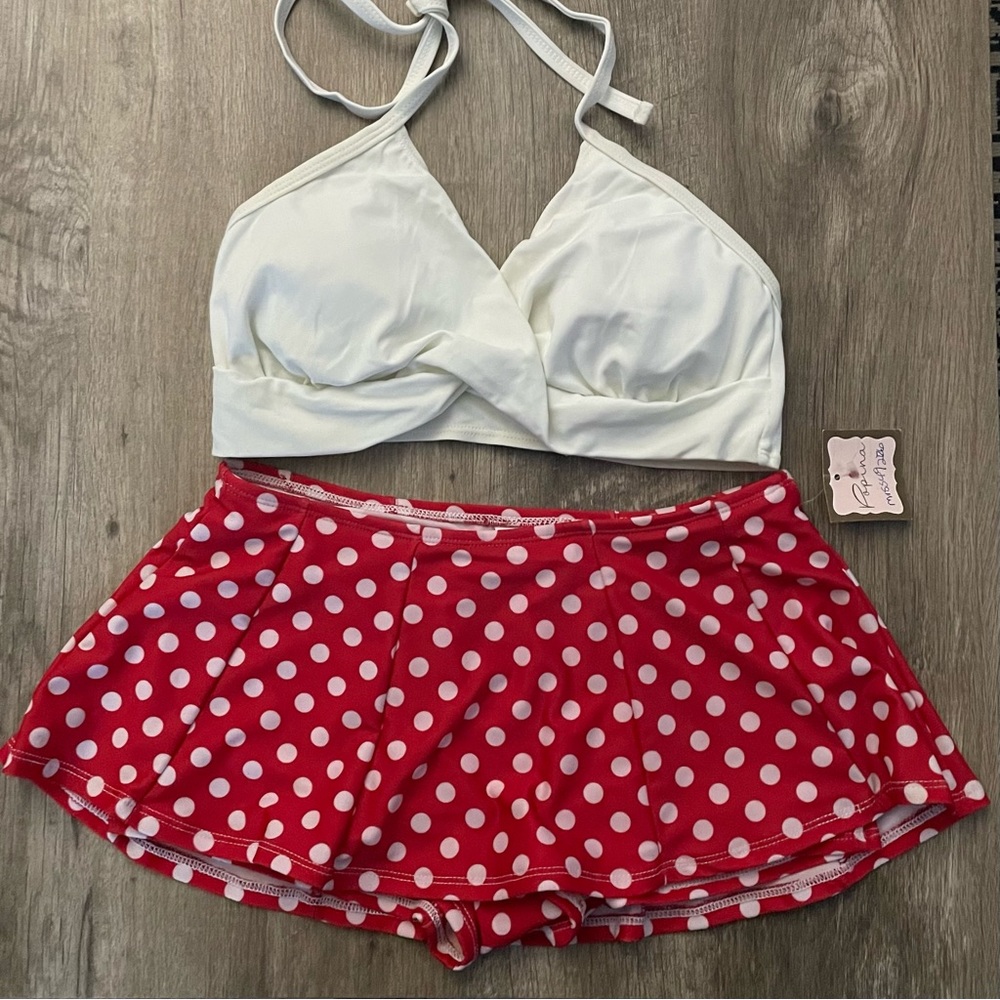 Popina 2 pc swimsuit. NWT